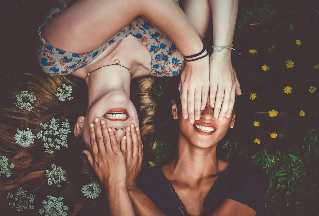 female couple playing a game to foster emotional connection